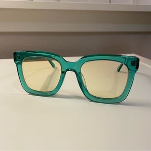 Artsy oversized green eyeglasses with yellow tinted lens